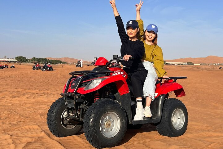 Experience the vastness of the Arabian Desert while conquering sand dunes on a quad bike. Stop to savor the striking scenery and enjoy refreshing treats along the way.
